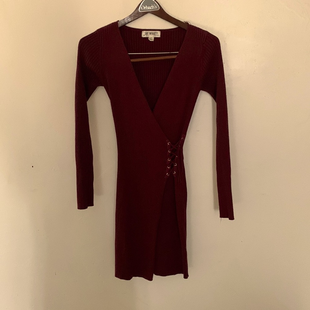 Long sleeve short cut dress.